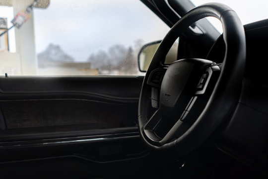 Interior of a car at a gas station in winter
