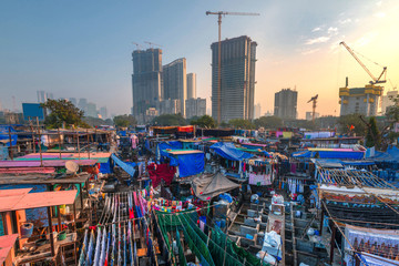 .Dhobi Ghat also known as Mahalaxmi Dhobi Ghat is the largest open air laundromat in Mumbai. one of the most recognizable landmarks and tourist attractions of Mumbai - 353428421