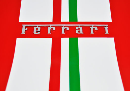 LONDON, UK - CIRCA SEPTEMBER 2011: Ferrari sign and Italian flag colored stripes on car bodywork.