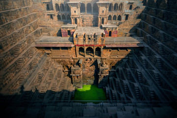 .Perspective stone stairs of the famous and deepest Chand Baori Step Well in Abhaneri, Rajasthan,...