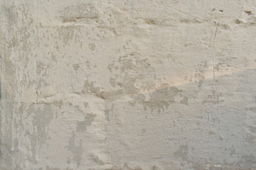 Obraz premium Textural background white wall of an old house