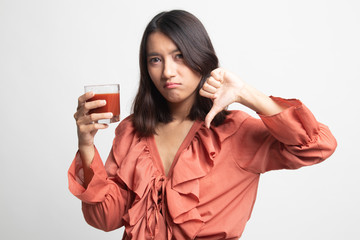 Asian woman thumbs down  hate tomato juice .