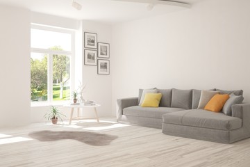White living room with sofa and summer landscape in window. Scandinavian interior design. 3D illustration