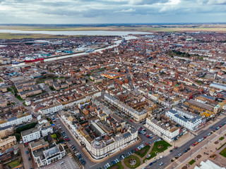Fototapeta na wymiar Aerial view of industrial sea side town