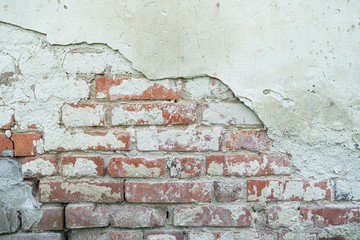 Old cracked concrete cement wall. Cracked wall. Brick wall with damage. Vintage texture style for graphic design or retro wallpaper