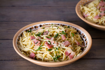 Garlic Bacon spaghetti pasta. Italian cuisine, pasta meal. Horizontal image