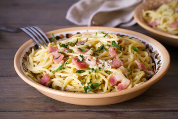Garlic Bacon spaghetti pasta. Italian cuisine, pasta meal. Horizontal image