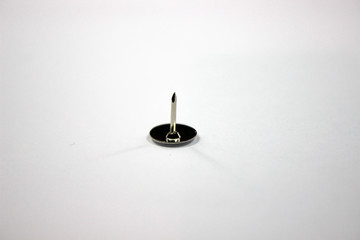 close up of a push pin