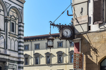 A beautiful captured moment in time in  Florence Italy, European culture, clock and lantern