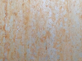 The stainless steel surface has rust stains.