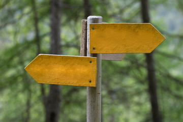 Tourist direction signs in the mountains. Mountain trails.