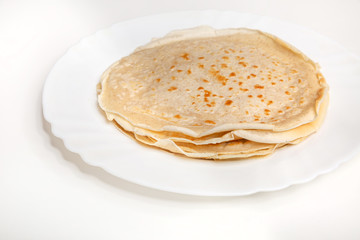 Tasty pancakes on Shrovetide on background