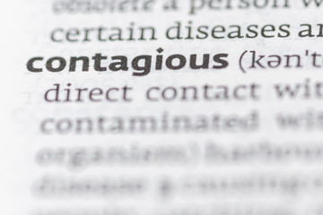 Definition of the word contagious on a dictionary page