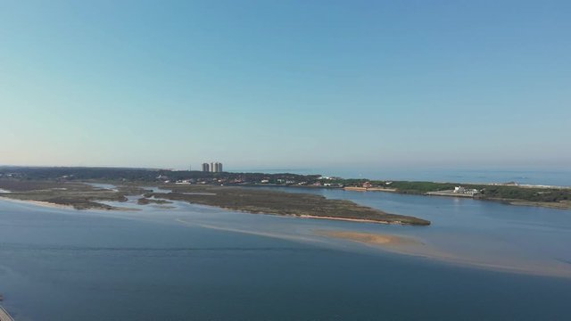 DRONE AERIAL FOOTAGE - Northern Litoral Natural Park in Ofir, Esposende, Portugal. The Cavado River estuary.