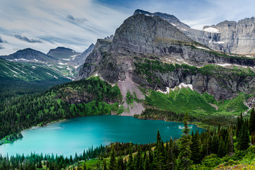 0000304 Angel Wing mountain and beautiful turquoise Grinnell Lake as storm clouds close in at...