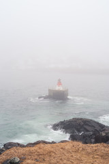 Buoy in the St. John's harbour, covered in fog