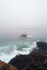 Buoy in the St. John's harbour, covered in fog