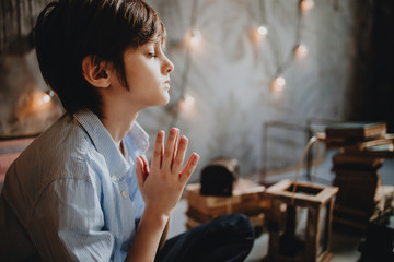 A boy meditating in Quarantine
