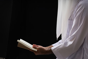 Religious Muslim man praying