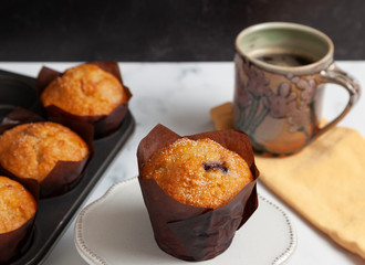 Blueberry muffin with coffee