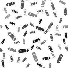 Black Skateboard trick icon isolated seamless pattern on white background. Extreme sport. Sport equipment. Vector Illustration.