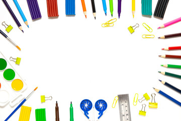 pencils, pens, paints, scissors, plasticine, brushes, on a white background.