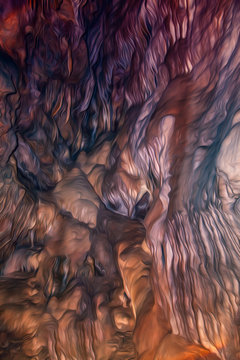 Colorful cave texture in digital processing as an oil painting. Lines with smooth outlines. Red with brown colors. Flowing shapes.