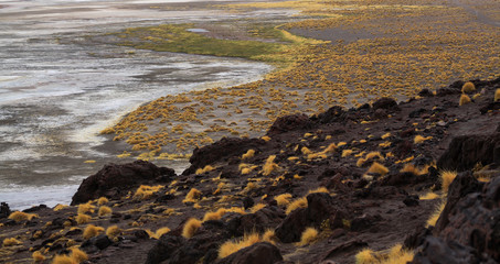 rocky landscape in a red lagoon Bolivia