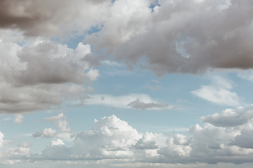 Naklejka na ściany i meble View of the cloudy sky in springtime