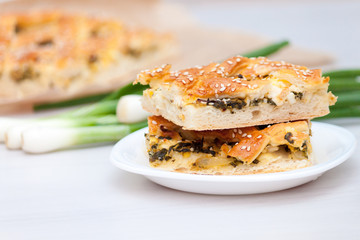 Spinach pie or spanakopita with spinach, cheese, eggs, onion.