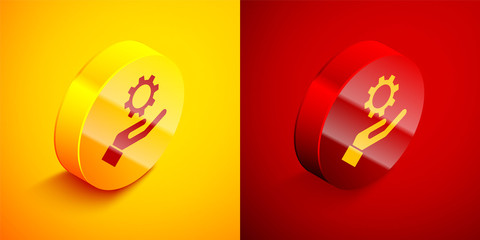 Isometric Settings in the hand icon isolated on orange and red background. Circle button. Vector Illustration.