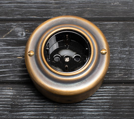 old-style power strip, light switch, scuffs and scratches