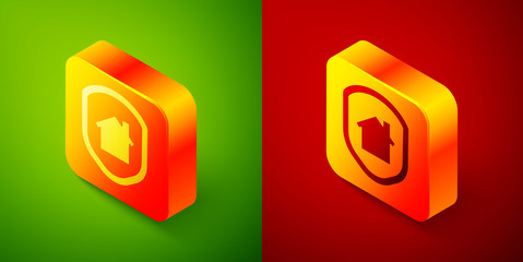 Isometric House under protection icon isolated on green and red background. Home and shield. Protection, safety, security, protect, defense concept. Square button. Vector Illustration.