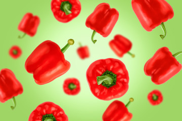 Falling red bell peppers isolated on a colored background with clipping path as package design element and advertising. Flying vegetables. Top view.