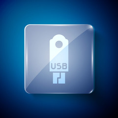White USB flash drive icon isolated on blue background. Square glass panels. Vector Illustration.