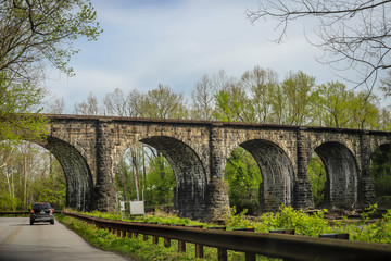 Fototapeta na wymiar Thomas Viaduct, a historic arch bridge built between July 4, 1833, and July 4, 1835. 