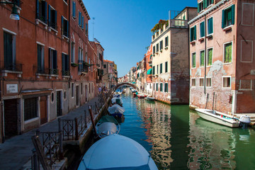 Obraz na płótnie Canvas Venice canal, gondolas near the houses
