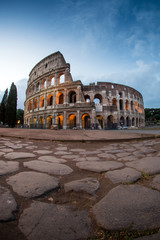 Fototapeta na wymiar Rome, Italy Collosseum at dawn e roman stones
