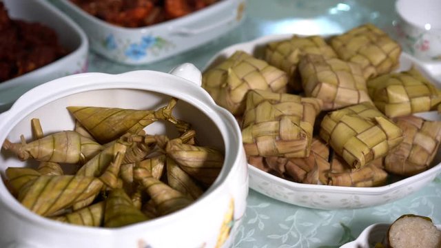 Malaysian local traditional food, lemang, ketupat, ketupat palas and other eat during eid mubarak or known as Hari Raya Aidilfitri celebration. Eat together with curry or rendang.