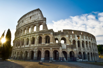  Colosseum or Coliseum in Rome and morning sun, Italy,