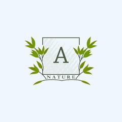 Green eco letters A logo with leaves in square shape. Initials with botanical elements with floral letter design for business identity style