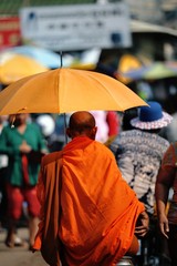 buddhist with an umbrella