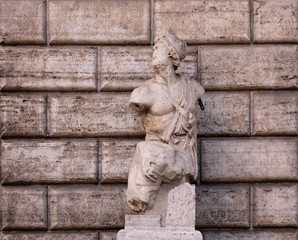 The ancient Hellenistic-style statue known as Pasquino, one of the famous talking statues of Rome. It is found in Piazza di Pasquino, at the corner of Palazzo Braschi