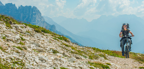 Fototapeta premium Caucasian Men Riding on Mountain Bike