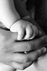  children's hands in black and white