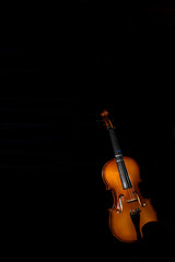 Fototapeta premium Violin against a black background