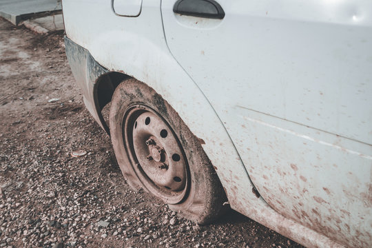 A Flat Tire At The Car