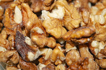Peeled walnuts close-up. Surface texture. Healthy diet.