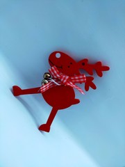 red wooden christmas deer