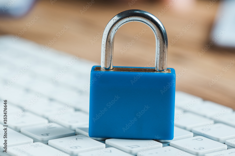 Poster blue lock on computer keyboard
